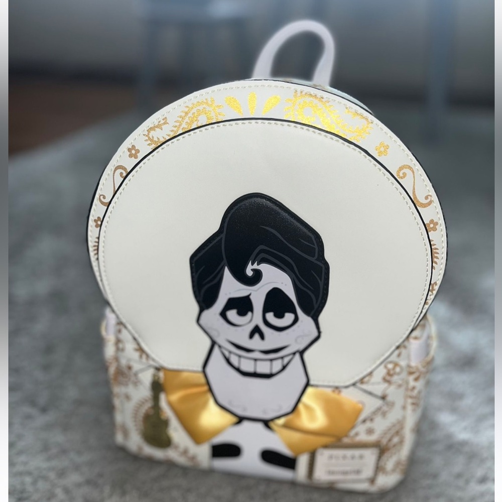 Loungefly Pixar Coco Ernesto De La Cruz Backpack in Gold Yellow and White. NWT - Picture 10 of 13